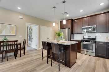 Granite countertops in kitchen w/large undermount sinks